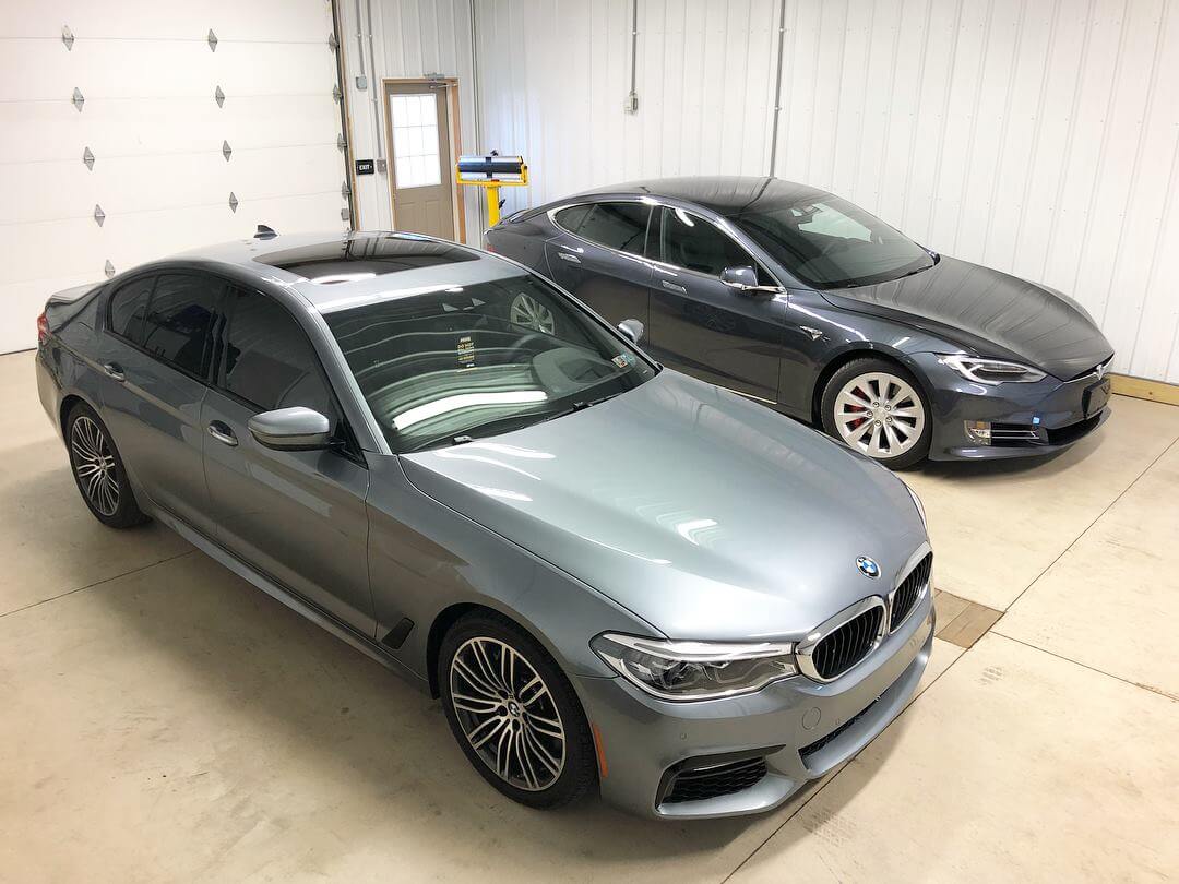 BMW and Tesla after window tint installation in Pittsburgh